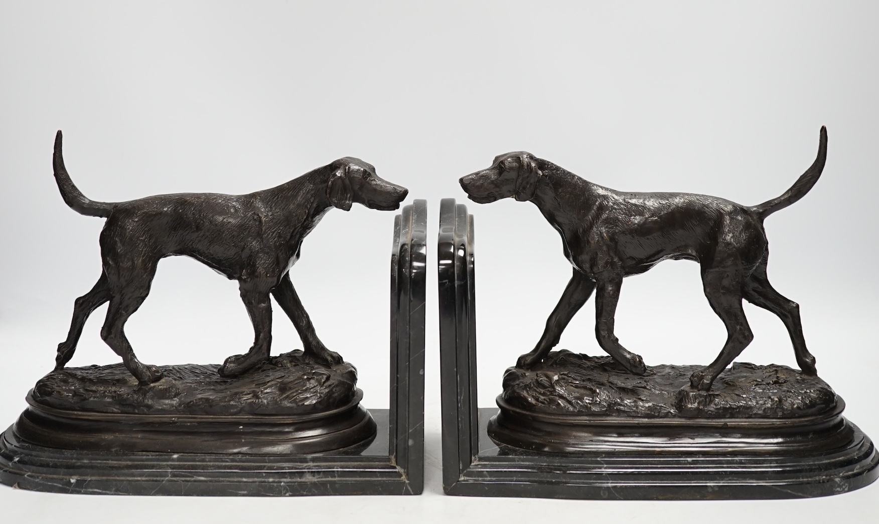 After Pierre-Jules Mêne (1810-1879), a pair of bronze models of hunting hounds